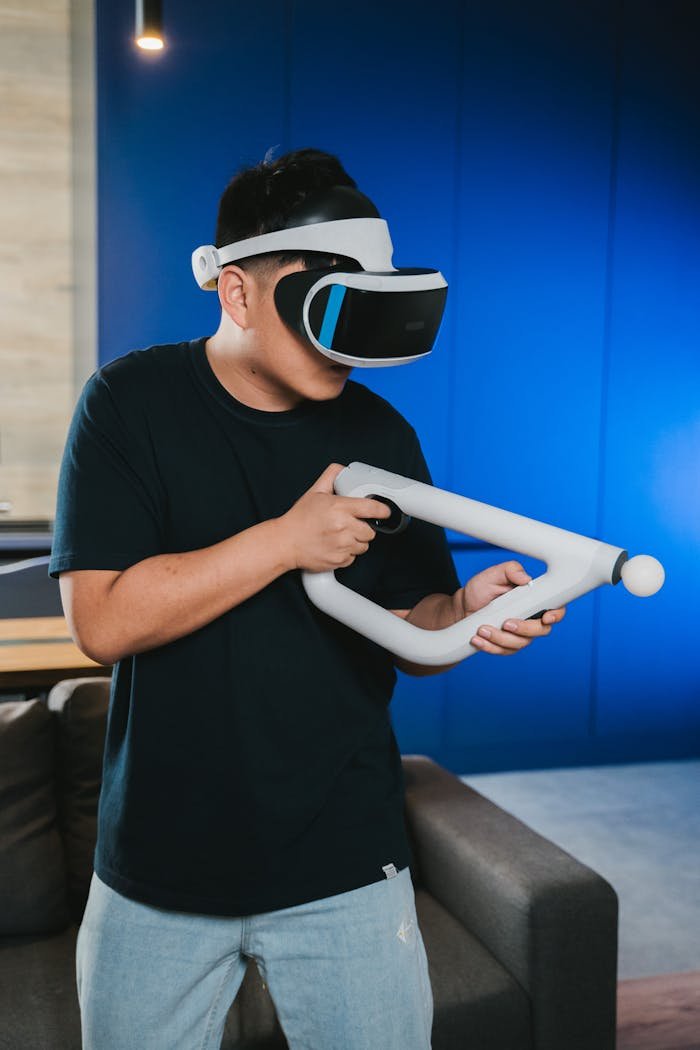 Adult man enjoying a VR gaming experience indoors with headset and controller.