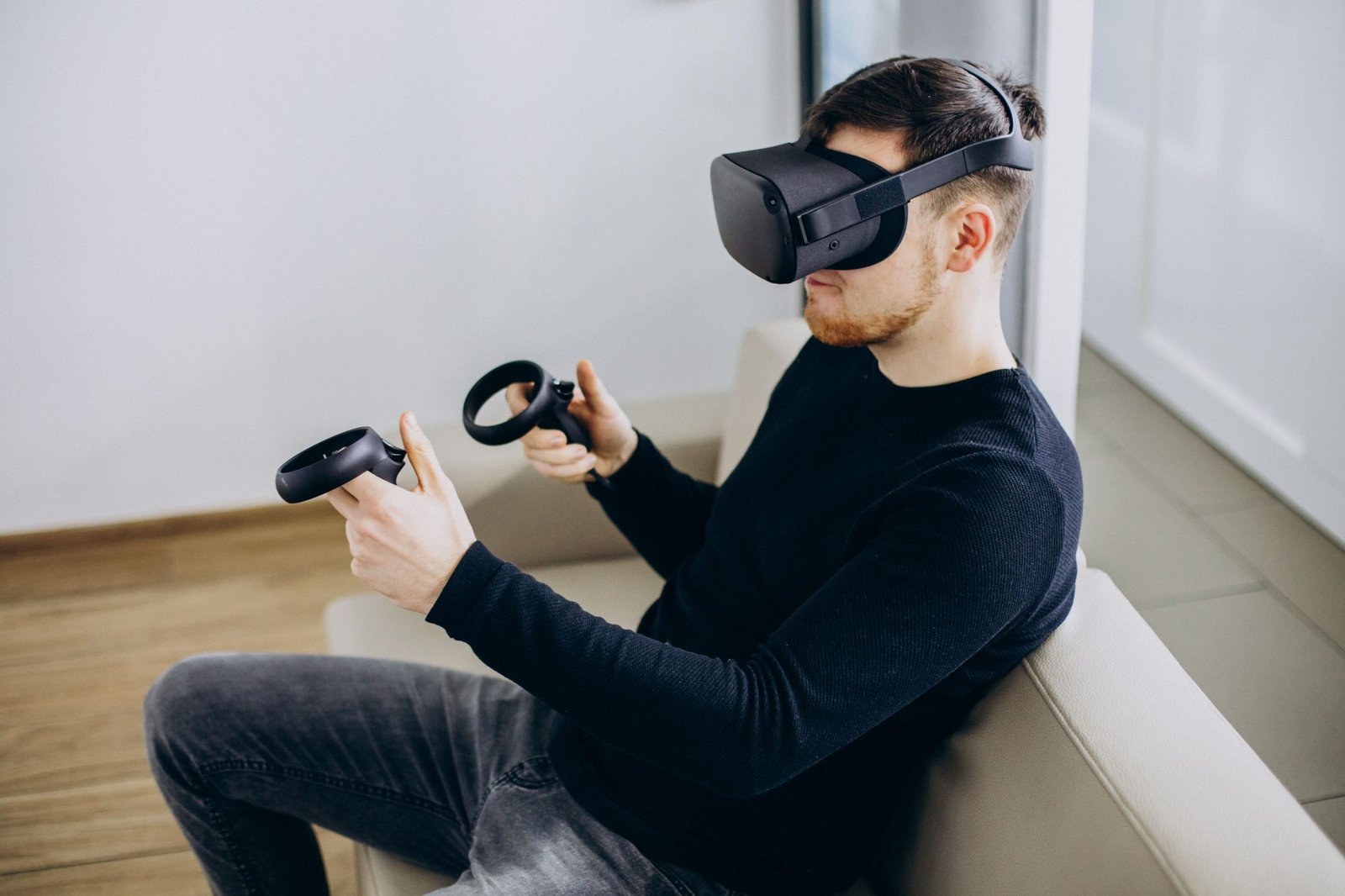man-using-playing-with-vr-glasses-11zon