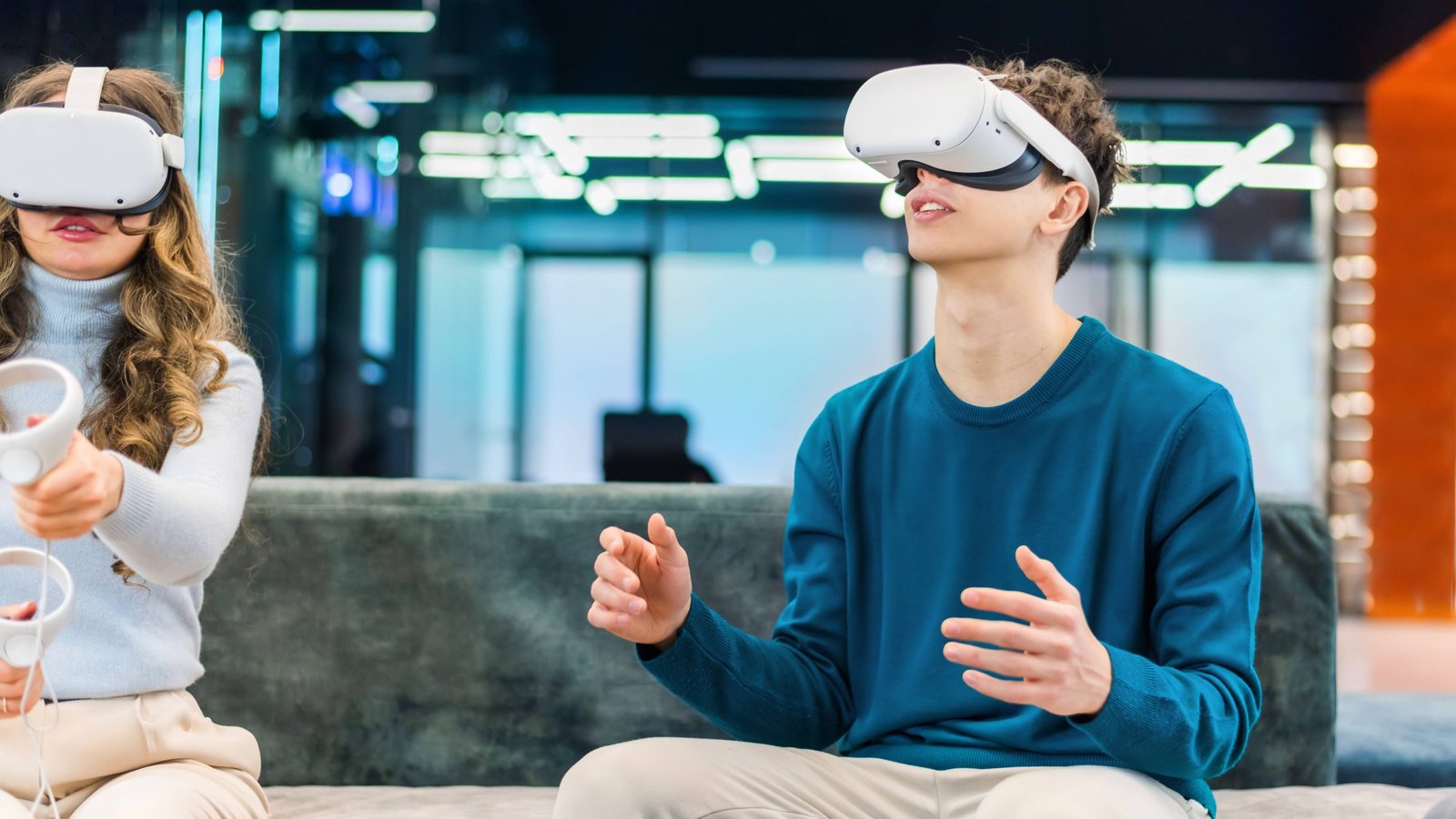 young-man-woman-exploring-virtual-reality-office-11zon